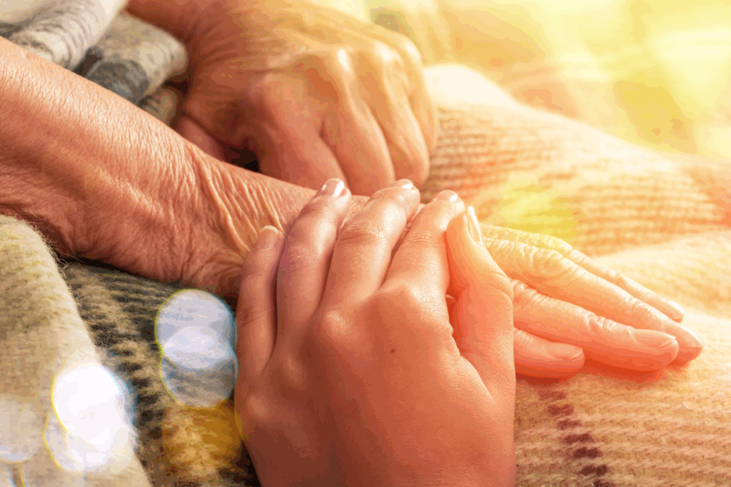 hospice patient caregiver hands